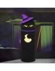 A черен 2-в-1 силиконов несесер Legami Kawaii - Kitty Witch с форма на коте, лилава вещерска шапка и светеща луна стои пред неонови рафтове. Надписът гласи "Тъмната страна на мяукането". Идеален за ученически аксесоари!.-8-thumb