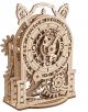 The 3D дървен пъзел Ugears - Старинен будилник (43 части) е модел на ретро часовник с фини зъбни колела, изрязани орнаменти, римски цифри и декоративни стрелки, сглобява се от преплетени дървени елементи.-2-thumb