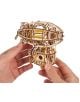 Две ръце държат 3D дървен пъзел Ugears - Стиймпънк Дирижабъл, 170 части, сложен механичен модел дирижабъл с видими зъбни колела и жълти гумени ленти, подчертаващи уникалния му стиймпънк дизайн.-2-thumb
