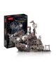 3D пъзел Cubic Fun - Пиратски кораб Тортуга, 218 части, е сглобен до черно-златистата си кутия с изображение на готовия модел и пристанищната сцена.-3-thumb