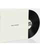 180g Arctic Monkeys - Suck it and See (VINYL) частично се измъква от бялата си опаковка, като в центъра се вижда "SUCK IT AND SEE" с обикновен черен текст и частичен поглед към етикета на плочата.-thumb