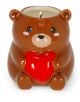 Ароматна свещ Legami - Teddy Bear е кафяв керамичен свещник с форма на мече и запалена свещ в него, с червено сърце, сладки черти, розови бузки и изпълващ стаята ви със сладкия аромат Berry Kiss.-3-thumb
