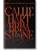 Корицата на книгата с огнен текст "CALLIE HART BRIMSTONE" на черен фон, въглени и син пламък в О. Brimstone (The Fae and Alchemy, Book 2) е завладяващо продължение от авторката на бестселъри №1 на New York Times.-1-thumb