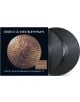 Изображението показва обложката на Bruce Dickinson - The Mandrake Project (2 VINYL) с бронзова монета с растение мандрагора и текст "MORTE CAPUT, NON CARCERE, 1941, 1968". До нея са изобразени две черни винилови плочи.-thumb
