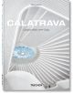 Корица на книгата за Calatrava: Монография на архитекта, представяща футуристичен бял интериор с широки извивки и кръгъл покривен прозорец със сини и бели геометрични шарки.-1-thumb