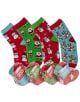 Четири чифта Детски магически коледни чорапи Out of the Blue - със забавни снежни човеци, Санти, пингвини и северни елени - са показани над четири празнични кубчета Magic Socks. Идеален подарък за деца през този празничен сезон!.-6-thumb