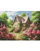 Уютна къщичка със сламен покрив е сгушена сред буйни зелени дървета и розови цветя, също като Диамантен гоблен Ideyka - Уютна вила. Каменна пътека води до вратата ѝ под слънчево синьо небе с разпръснати облаци.-thumb