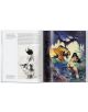 Разпространението от "Frazetta (Basic Art)" включва: лява страница - черно-бяла рисунка на гола жена с меч и текст; дясна страница - живо изкуство, вдъхновено от Фразета, показващо гола жена, изправена пред ревящ тигър в джунглата.-3-thumb