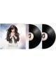 Indila - Mini World (2 VINYL): двойна винилова плоча с обложка, показваща жена с дълга тъмна коса в черно сако и бяла рокля на фона на нежно небе. Френски поп албум.-thumb