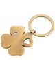 Ключодържател Troika - Girls Best Friends Clover Bronze е ключодържател в златист цвят с талисман от четирилистна детелина с блестящи кристали, сърцевиден изрез и надпис TROIKA.-1-thumb
