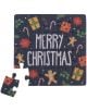 Коледна картичка-пъзел Out of the Blue, 20 части с "Весела Коледа" в центъра, заобиколен от джинджифиловите човечета, бастунчета, имел и подаръци. Един ъглов елемент е отделен-идеален подарък за Коледа!.-2-thumb