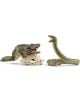 Две реалистични фигурки на играчки Schleich - крокодил върху пясъчно гнездо с две бели яйца и съскаща змия - са изложени една до друга на бял фон, идеално за феновете на Опасни влачуги в книжарница Orange.-2-thumb
