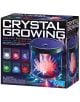 Опаковката на Креативен комплект 4М - Отгледай кристали в цветен дисплей показва светещи цветни кристали в дисплей, с информация за продукта - идеален избор за любителите на образователни играчки.-1-thumb