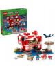 Комплектът „LEGO Minecraft Къщата на Муухоморка“ включва червено-бяла къща във формата на гъба, минифигурки, животни и аксесоари. Съдържа 272 части и е подходящ за деца над 8 години. На кутията е изобразена сглобената сграда.-2-thumb