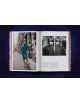 LIFE Холивуд: Отворена книга на тъмносиня повърхност показва цветна снимка на жена в тилова рокля на градска улица, а на дясната страница има два черно-бели портрета, които напомнят класическите архиви на списание LIFE Холивуд.-8-thumb