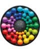 Кръглата черна дъска за пъзел, част от IQ Deluxe Circle Логическа игра на Smart Games, съдържа дванадесет ярко оцветени взаимосвързани части - сини, зелени, жълти, оранжеви, червени и розови, подредени в спирала.-2-thumb