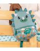На дървено двуетажно легло стои малка раница Miquelrius Dino roar с едно отделение, в тюркоазен цвят и с мотив на динозаври, изработена от екологичен полиестер. Раницата е украсена със забавни шипове, усмихнато лице и цветни динозаври в долната ѝ част. На-4-thumb