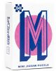 В кутията с надпис Мини пъзел Професор Пъзел - Букви, асортимент е изобразена голяма синя буква М върху розов кръг, която представя английска азбука. В горния ляв ъгъл се появява икона на парче пъзел "50". Този детски пъзел е предназначен за възраст 6+.-3-thumb