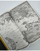Отворената книга разкрива черно-бяла карта с региони като Ий Ландс, Елудар, Загос Естейт, Тирел и Ара, която потапя читателите в богатия свят на "Майката на смъртта и зората" (Войната на изгубените сърца, книга 3) на Кариса Броудбент.-2-thumb