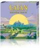 Корица на настолна игра Катан: Енергийни ресурси, представяща стилизиран градски пейзаж на залез, вятърни турбини, мост и поля, с голям жълт надпис отгоре. Налично в книжарница Orange.-1-thumb