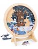 Образователен пъзел Hape - 4 сезона, с поставка. Кръгъл дървен пъзел със сценка на зима: животни около дърво, заснежена земя и цветни горски детайли. Частично нареден, няколко части са разпръснати наблизо - идеален за обучение.-3-thumb