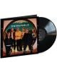 OneRepublic - The Collection (VINYL), частично изваден от калъфа, на който групата стои на открито по залез слънце. На обложката са изобразени "ONEREPUBLIC" и "THE COLLECTION" в бяло върху този уникален сборен албум на OneRepublic.-thumb