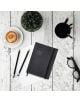 Седмичният тефтер-органайзер Miquelrius Luxor & Ágora Negro 2026 с кожени корици, моливи и други офис принадлежности е поставен на бяла рустикална дървена маса.-6-thumb