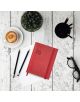 Седмичен тефтер - органайзер Miquelrius Luxor & Ágora Rojo 2026 лежи на бяла дървена маса в близост до чаша кафе, кактус в саксия, два черни молива, празна хартия, черен моливник с жълти моливи и черни очила.-6-thumb