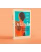 Книгата "Орланда" стои изправена на прасковен фон, с абстрактна илюстрация на фигура в кафяви и оранжеви нюанси върху тилова корица.-2-thumb
