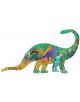 Илюстрация на пъзел Floss & Rock, Dino - Динозаври, 40 части, оформен като динозавър и показващ деца, цветни динозаври, растения, водопади, скали и дървета в очертанията му.-2-thumb