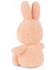 Мека, 23-сантиметрова плюшена играчка Miffy Terry - бледооранжев заек от Bon Ton Toys е показан отзад, седнал с изправени дълги уши и леко разтворени ръце и крака.-3-thumb