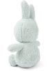 Мека, бледозелена плюшена играчка Miffy Terry заек, 23 см, седи изправен с гръб към вас, показвайки двете си дълги уши и кръглата пухкава опашка.-3-thumb