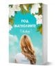 На 3D визуализираната корица на книгата е изобразена жена с дълга руса коса, обърната настрани, гледаща към синьо небе с бели облаци и магнолии. Заглавието гласи Под Магнолиите от Т. А. Лоу, а в долната част е изписано Хеликон.-1-thumb
