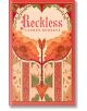 Корица на книгата „Reckless Ultra Deluxe Edition“ от Лорен Робъртс, на която е изобразено стилизирано сърце, украсено с цветя и стрелка, сочеща надолу, всичко това в наситени червени, оранжеви и златисти нюанси с изящни декоративни мотиви — изключително к-thumb
