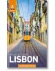 Жълт трамвай се изкачва по калдъръмена улица с цветни сгради в Лисабон, Португалия, на корицата на Rough Guides Walks and Tours Lisbon: Пътеводител с електронна книга - идеалният спътник за пешеходни обиколки в Лисабон.-thumb