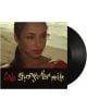 На обложката на Sade - Stronger Than Pride (VINYL) е изобразена жена с червено червило на плажа, която гледа замислено, а в долната част на обложката е изписан художествен текст "Sade Stronger Than Pride".-thumb