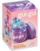 Слаймът „Gui Gui“ от колекцията „Glow-Up“, предлаган в кутия, се предлага в лилав контейнер и съдържа ароматен слайм с морски черупки и мъниста; опаковката на Moose е в розово и лилаво и показва четири различни текстури на слайма; подходящ за деца на възр-1-thumb