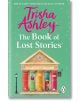Корицата на "Книга на изгубените истории" представлява причудлива книжарница със стълбове от цветни гръбчета на книги, зелен фон със звезди и името на автора с голям розов шрифт в горната част.-thumb
