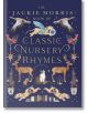 Книгата Jackie Morris Book of Classic Nursery Rhymes има илюстрирана корица с летящи гъски, петли, елени, котка, кучета, звезди, саксийни растения и книги на тъмносин фон.-thumb