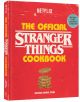 Официалната готварска книга "Странни неща" е червена готварска книга на Джошуа Дейвид Стайн, с подредени вафли на корицата и син етикет, на който пише "Рецепти от Хокинс и отвъд".-1-thumb