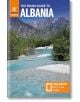 Корица на The Rough Guide to Albania: Travel Guide with eBook, на която са изобразени бистра синя река, скалисти брегове, зелени дървета, драматични планини и значка, подчертаваща безплатната електронна книга за независими пътешественици, включена в ръков-1-thumb