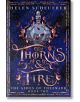 Метална рамка с детайли от рози обгражда заглавието "Тръни и огън" (The Ashes of Thezmarr, Book 2) на син фон с огън и тръни - зашеметяващо романтично продължение от Хелън Шойерер.-thumb