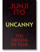 Черна корица на книгата с червени, подобни на клони жилки, с голям текст: JUNJI ITO в горната част, UNCANNY (името на продукта) в жълто в центъра и THE ORIGINS OF FEAR в червено - забележителна почит към мангата на ужасите.-2-thumb