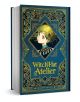 A hardcover book titled "Witch Hat Atelier" by Kamome Shirahama, featuring ornate gold designs and an illustrated girl with green hair on the cover.-1-thumb