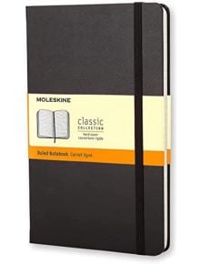 Черна книжка с твърди корици Голям тефтер Moleskine с твърди корици и еластична лента, с кремава хартиена лента с детайли в черно и оранжево - наличен в книжарница Orange.
