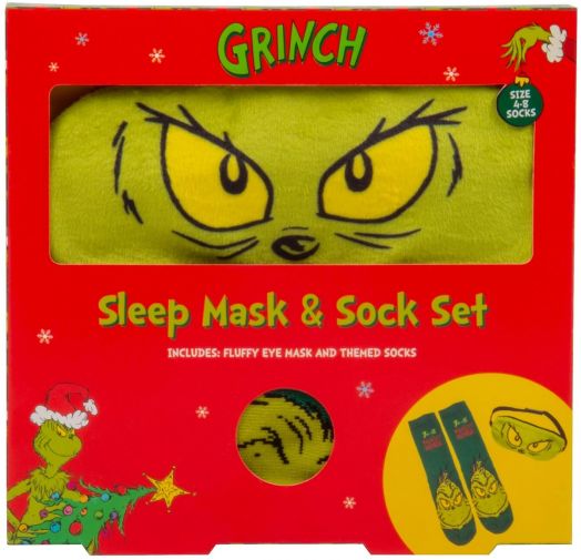 Празничната червена кутия съдържа Чорапи и маска за сън Fizz Creations - The Grinch: меки чорапи с лицето на Гринч и маска за сън с неговите жълти очи. Коледни графики и текст украсяват опаковката.-1