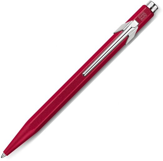 Червена механична химикалка Caran D'Ache 849 със сребрист метален клипс и бутон, изобразен на бял фон. Предлага се в книжарница Orange.-1