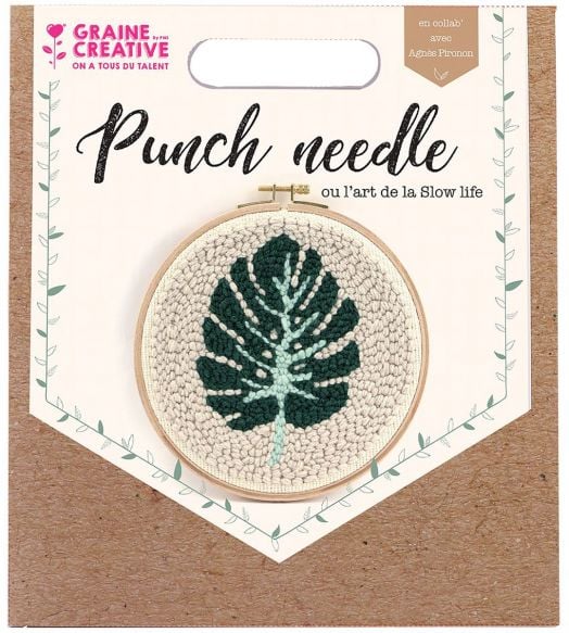 Комплект за пънч бродерия Graine Creative - Листо: опаковка с дизайн на зелен лист със светлосини акценти върху кремав фон, поставен в дървен обръч. Надписът гласи "Пробивна игла" и съдържа информация за марката.-1