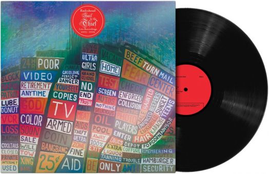 Винилова плоча се изплъзва от цветна обложка с ярки текстови блокове - обложката на Radiohead - Hail To The Thief (Live Recordings 2003-2009) (VINYL), уникален албум на живо.