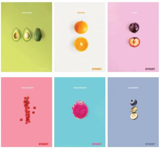 Шест минимални плаката показват плодове на ярки фонове - авокадо, оранжево и др. В долната част на всеки от тях е изписано името на плода плюс STREET, вдъхновено от Тетрадка Street Fresh Fruits А5, 60 листа с широки редове за свеж поп цвят.-7
